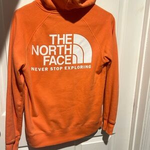 Orange north face hoodie sizes small